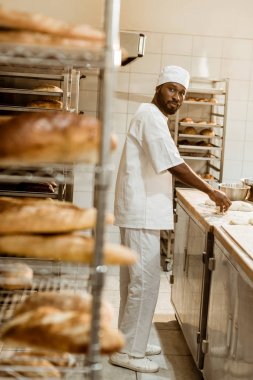 depositphotos_186865432-stock-photo-african-american-baker-preparing-raw